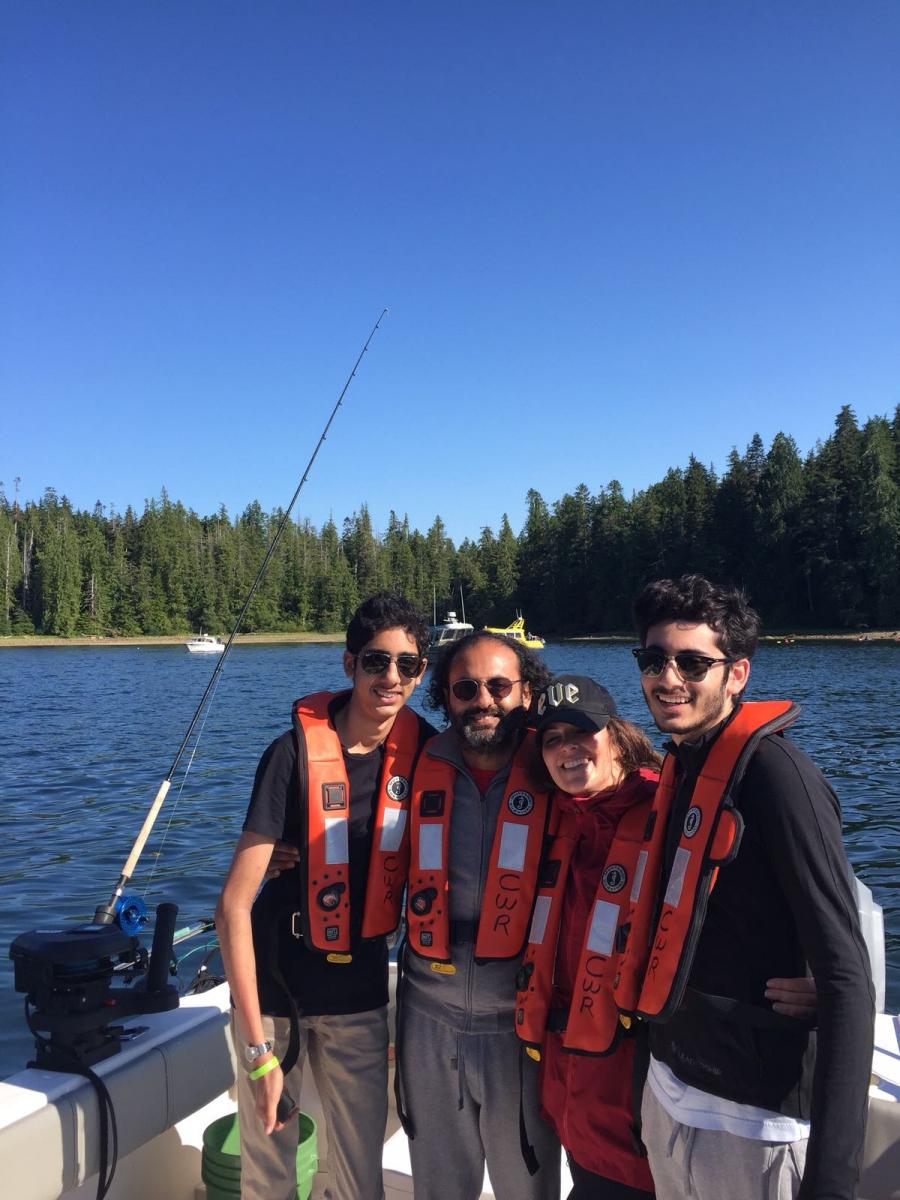 Feisal Alibhai (second from left) at Clayoquot Wilderness Resort, Canada with his younger son Kazim (far left), his beloved Suz (second from right) and older son Mahdi (right)