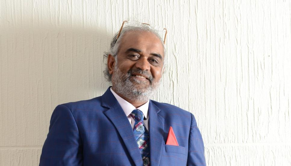 Savji Dholakia is the founder and chairman of Hari Krishna Exports.