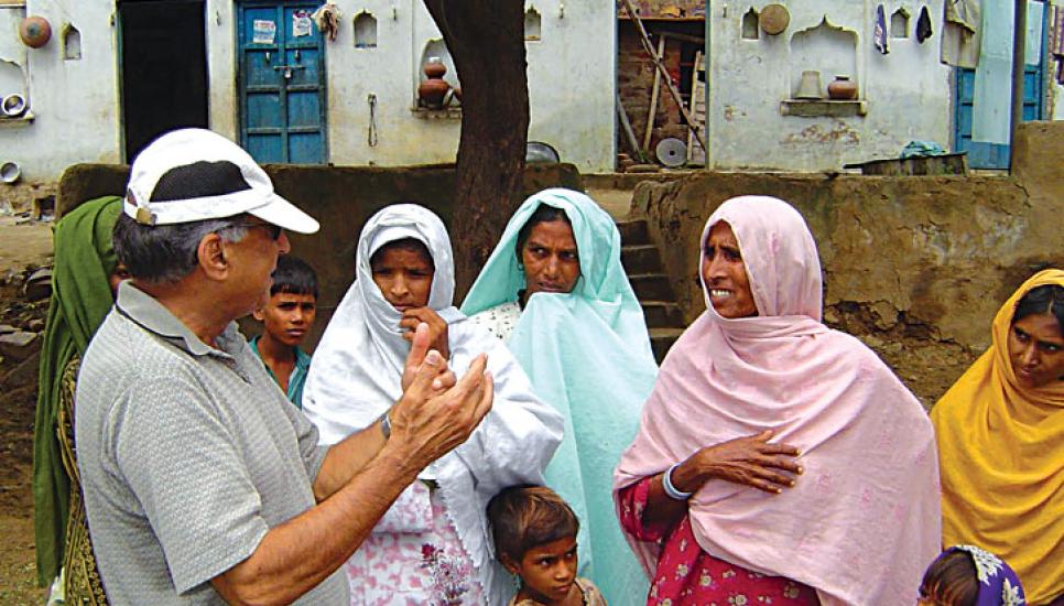 Dr Suri Sehgal with women from one of the villages helped by IRRAD